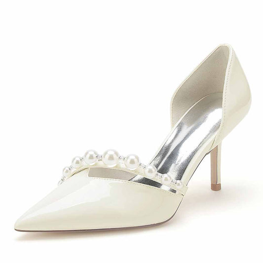 Elegant ivory pearl wedding heels for brides with a pointed toe and pearl embellishments