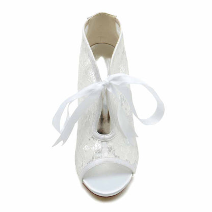 Elegant white lace ribbon wedding shoes for bride featuring an open toe and stylish bow detail