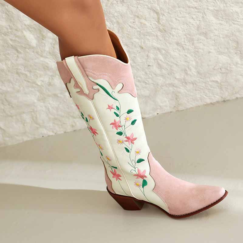 Stylish pink embroidered cowgirl boots with floral design and comfortable heel for a trendy look