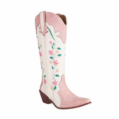 Pink embroidered cowgirl boots featuring floral designs and a stylish pointed toe