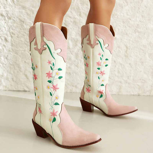 Pink embroidered cowgirl boots with floral design and stacked heel for stylish Western wear