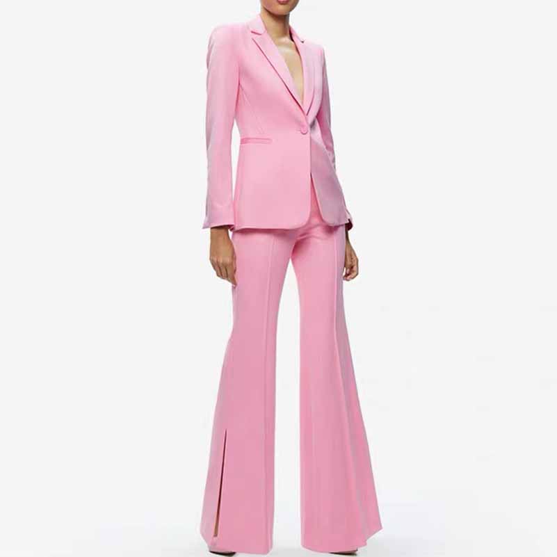 Stylish pink women's pantsuit for wedding featuring flared trousers and a tailored blazer