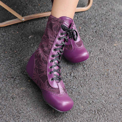 Stylish plus size lace-up wedge ankle boots in purple with a textured design and black laces