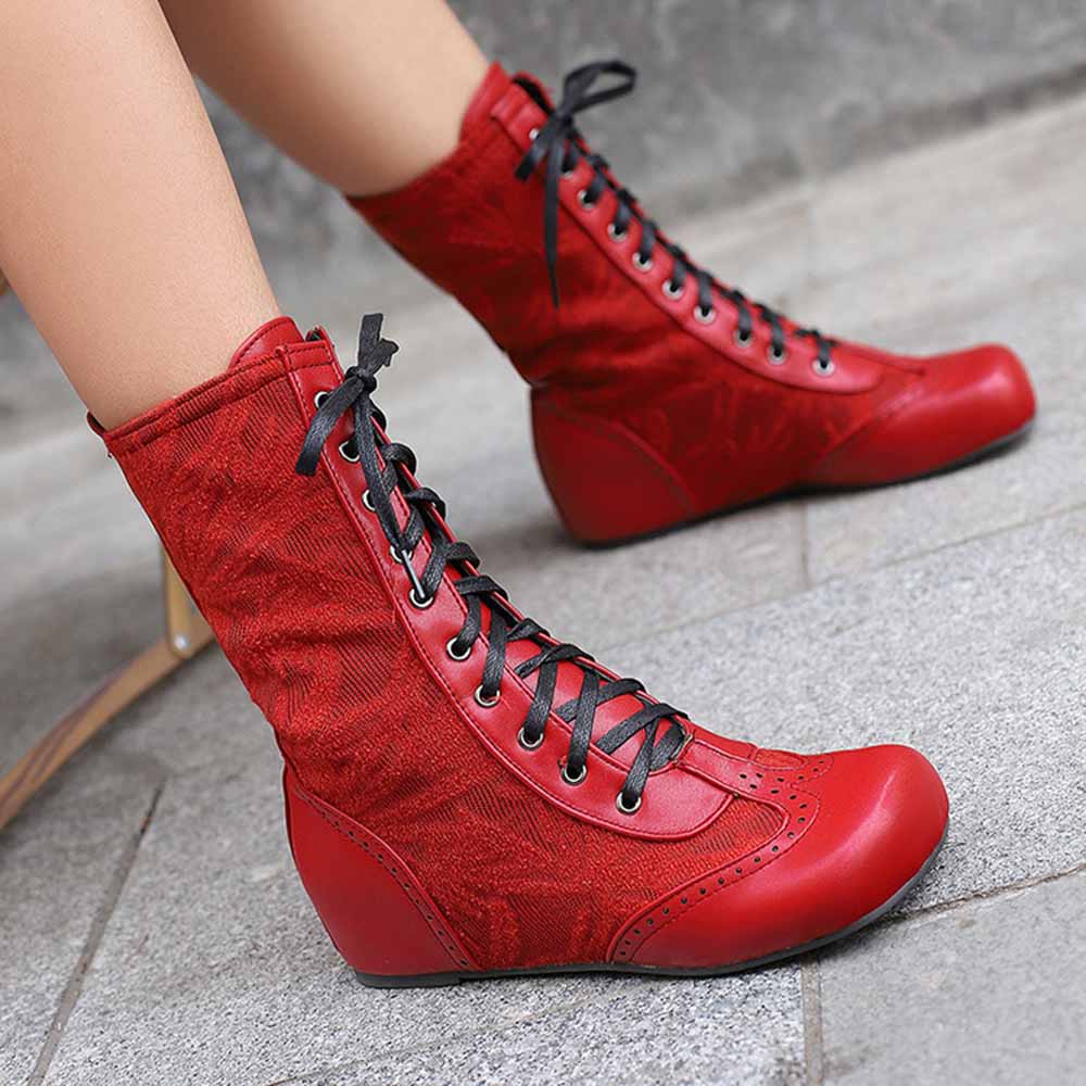 Stylish plus size lace-up wedge ankle boots in red with intricate detailing and a comfortable fit