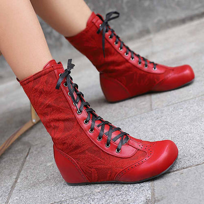 Stylish plus size lace-up wedge ankle boots in red with intricate detailing and a comfortable fit