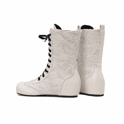 Stylish plus size lace-up wedge ankle boots in white with textured design and black laces