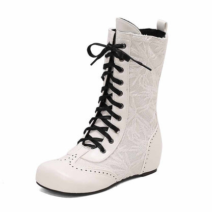Stylish plus size lace-up wedge ankle boots with intricate floral design and black laces for a chic look