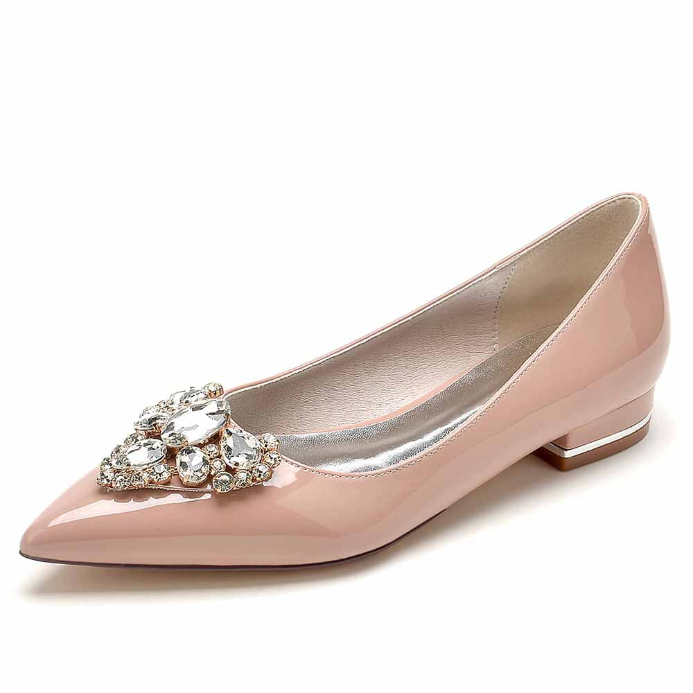 Elegant point toe bridal flats in blush pink with jeweled embellishment for weddings