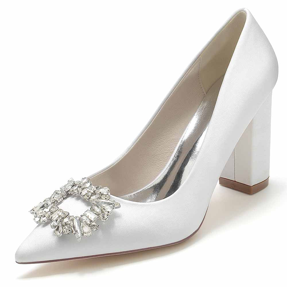 Elegant point toe satin wedding shoes by S&DCo. with a jeweled embellishment for a stylish bridal look