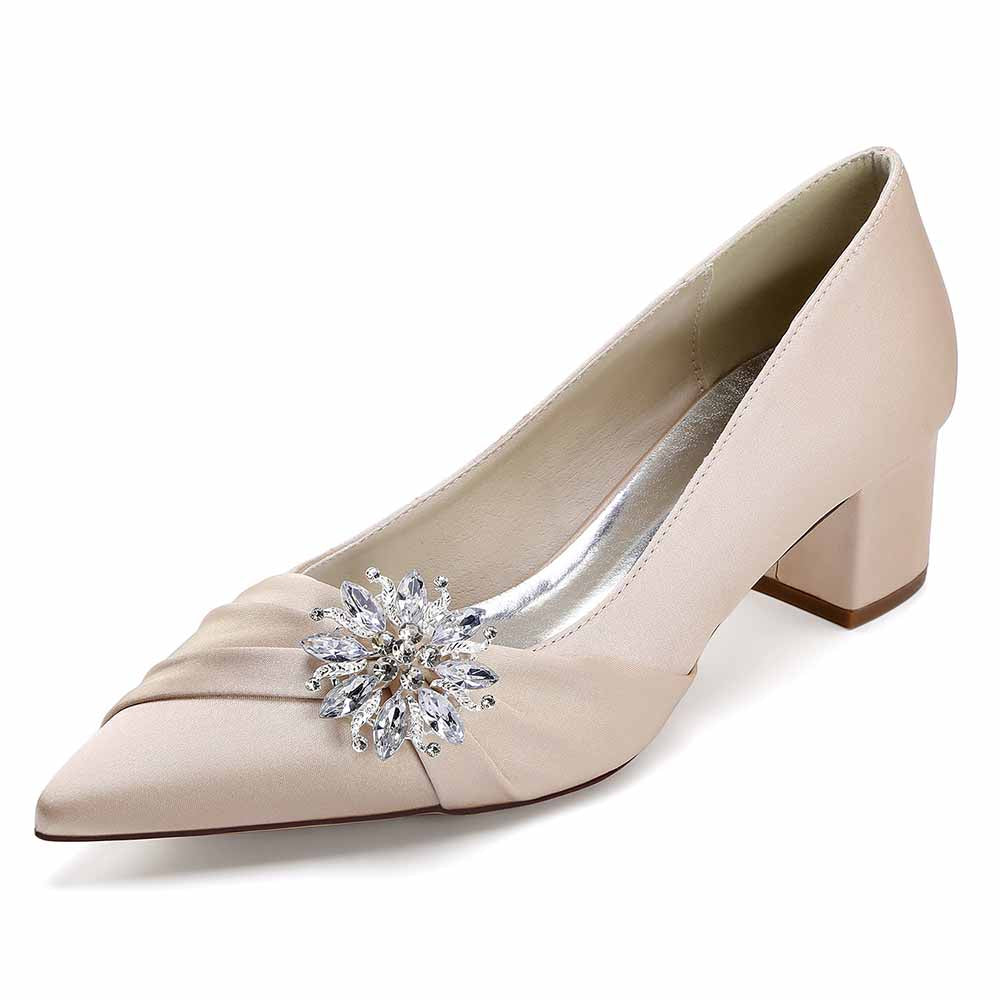 Elegant pointed toe wedding shoes for bride with a sparkling decorative detail in blush