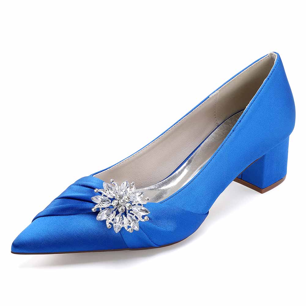 Blue pointed toe wedding shoes for bride with embellished floral detail and chic block heel