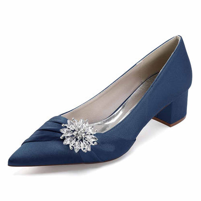 Elegant navy blue pointed toe wedding shoes for bride featuring a sparkly embellishment