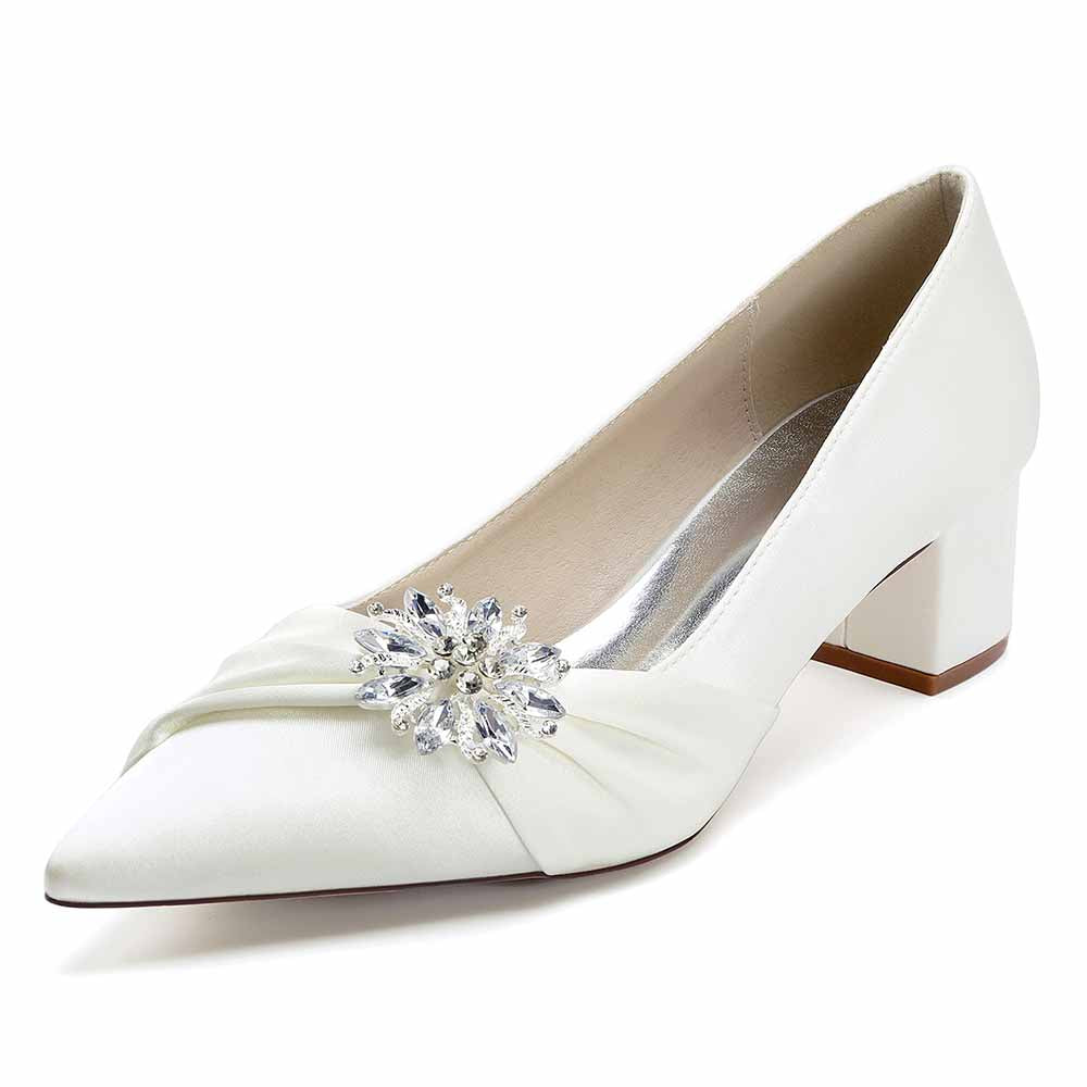 Elegant pointed toe wedding shoes for bride with a jeweled accent and comfortable block heel