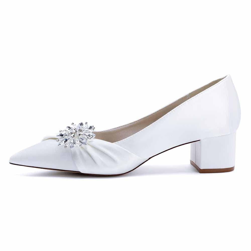 Elegant white pointed toe wedding shoes for bride with jeweled embellishment and block heel