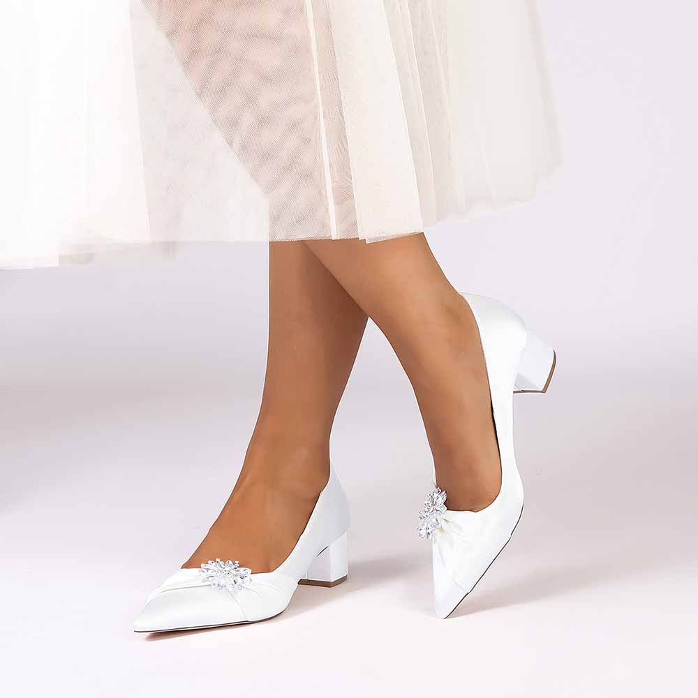 Elegant pointed toe wedding shoes for bride with decorative embellishments and comfortable heel
