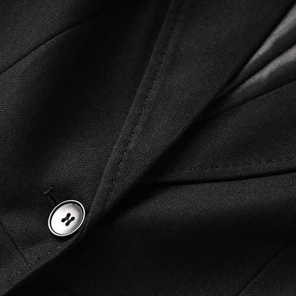 Close-up of SD Dresscode professional women's black suit for events showcasing fabric and button details