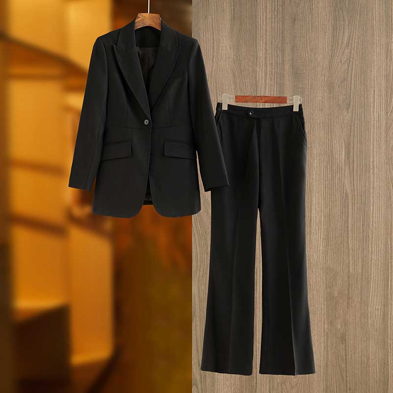 Professional women's black suit for events featuring a tailored blazer and matching trousers