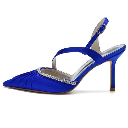 Elegant blue prom heels with crossing straps and rhinestone detailing for special occasions