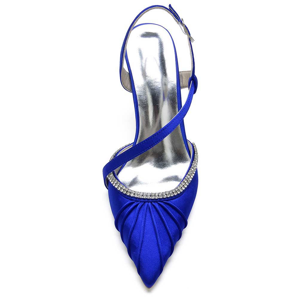 Stylish blue prom heels with crossing straps featuring a pointed toe and embellished details