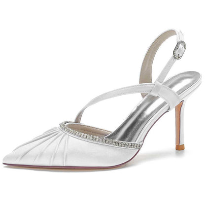 Elegant white prom heels with crossing straps and rhinestone detailing for special occasions