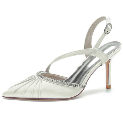 Elegant white prom heels with crossing straps and sparkling embellishments for special occasions