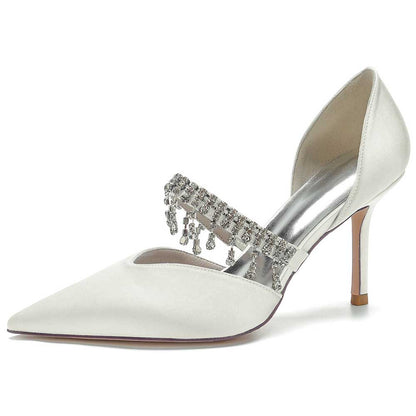 Elegant white prom heels with crystals featuring a pointed toe and stylish ankle strap