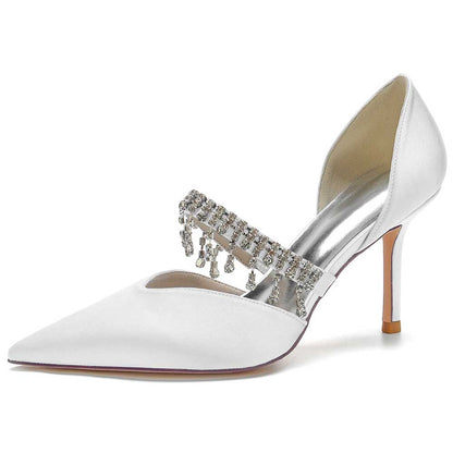 Elegant white prom heels with crystals featuring a pointed toe and stiletto heel for special occasions