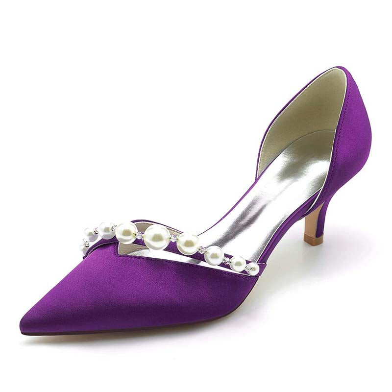 Purple high-heeled shoe with pearl embellishments on a white background