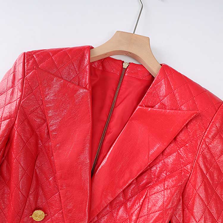 Stylish red faux leather mini dress with quilted design and gold button detail