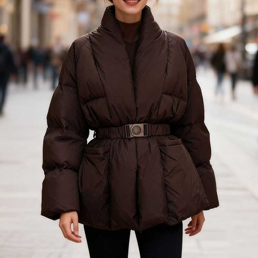 Model wearing a retro vintage cotton padded jacket with a belted waist and oversized sleeves