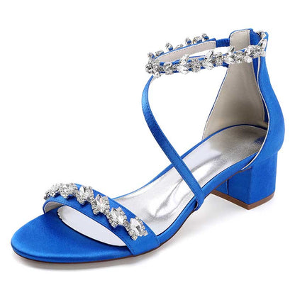 Elegant blue rhinestone bridal heels with ankle straps and block heel design for special occasions