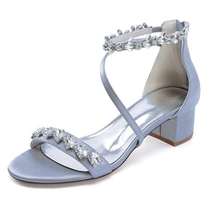 Elegant blue rhinestone bridal heels with ankle strap and block heel for special occasions