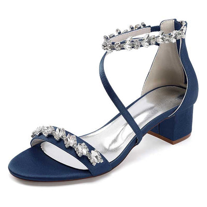 Navy blue rhinestone bridal heels with elegant straps and a block heel for special occasions