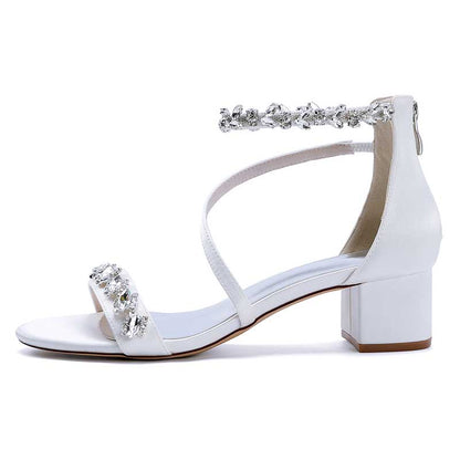 Stylish white rhinestone bridal heels with a block heel and elegant strap design