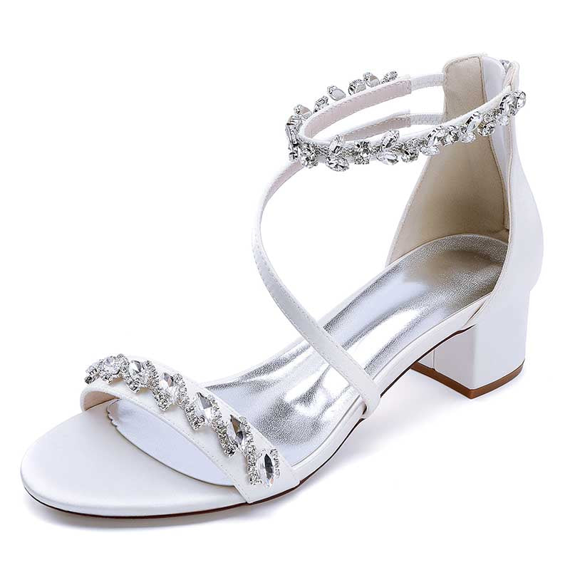 Elegant rhinestone bridal heels with a unique strappy design and block heels for comfort