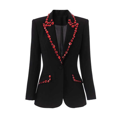 Rhinestone embellished black blazer featuring red accents and a tailored fit for a stylish look