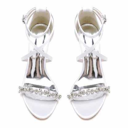 S&DCo. Rhinestone high heel wedding pumps with elegant cross-strap design and shimmering details