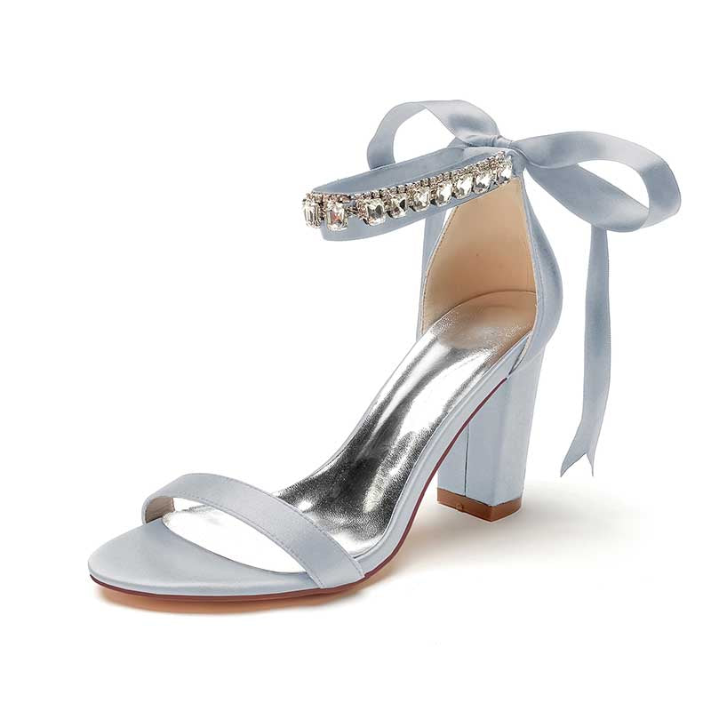 Light blue heels with rhinestones, perfect as rhinestone prom shoes for women with ankle ties