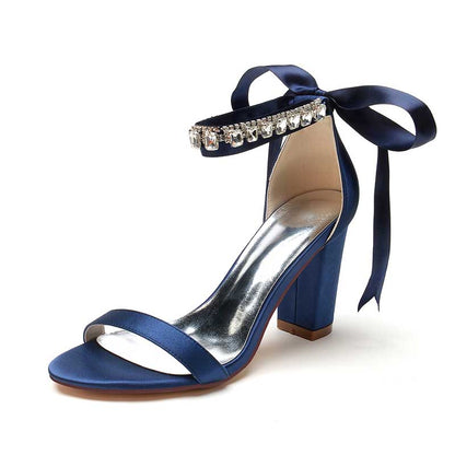 Navy satin heels with rhinestones and ribbon straps, perfect rhinestone prom shoes for women