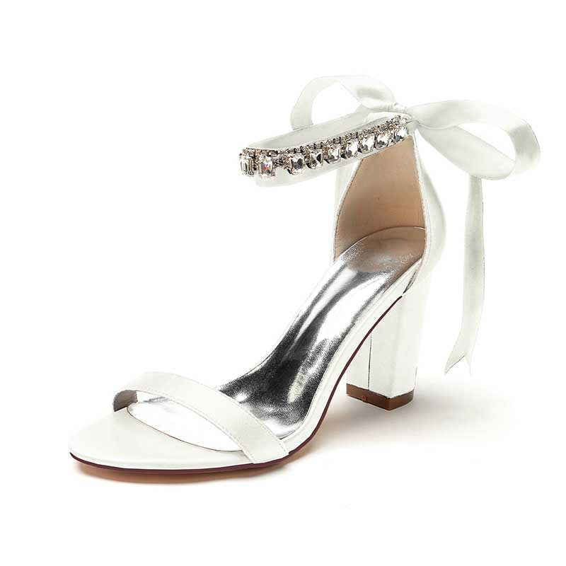 Elegant white heels with rhinestone strap and bow, perfect rhinestone prom shoes for women