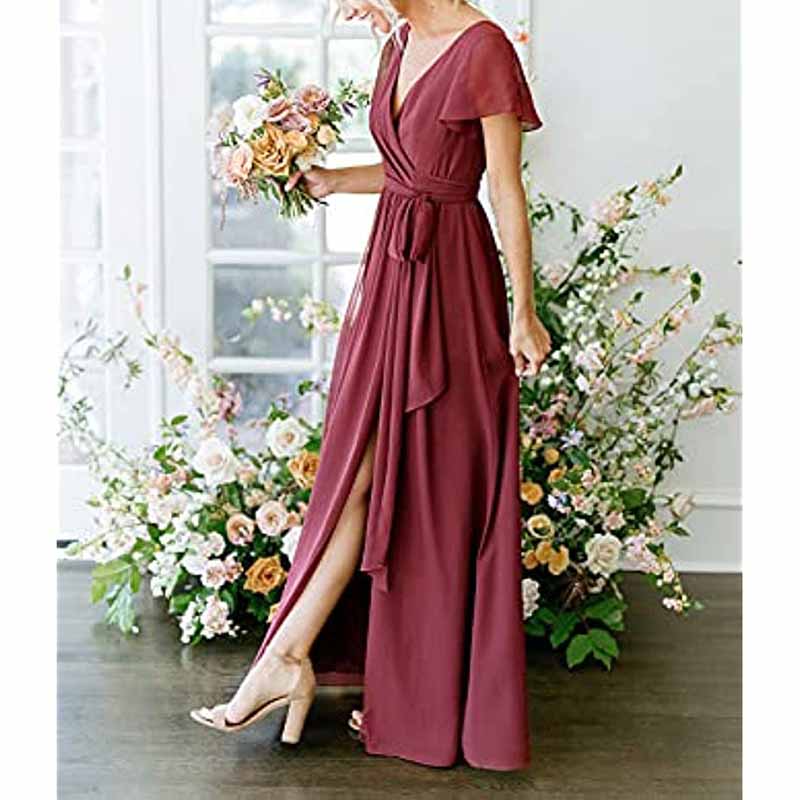 Elegant rustic wedding bridesmaid dress in burgundy with a flowy design and a thigh-high slit