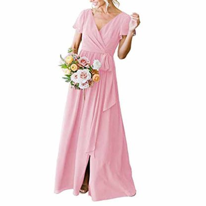 Elegant pink rustic wedding bridesmaid dress with a flowy skirt and a tie waist for a charming look