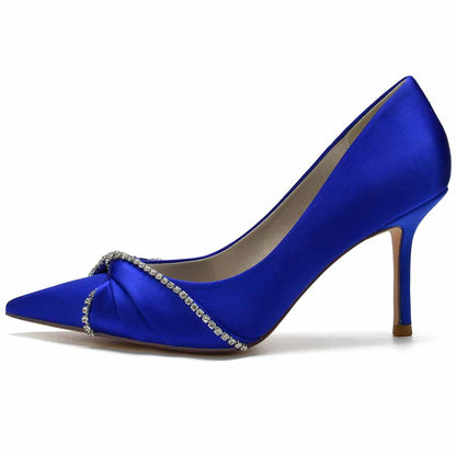 Elegant blue satin beaded wedding pumps with a stylish twisted design and pointed toe