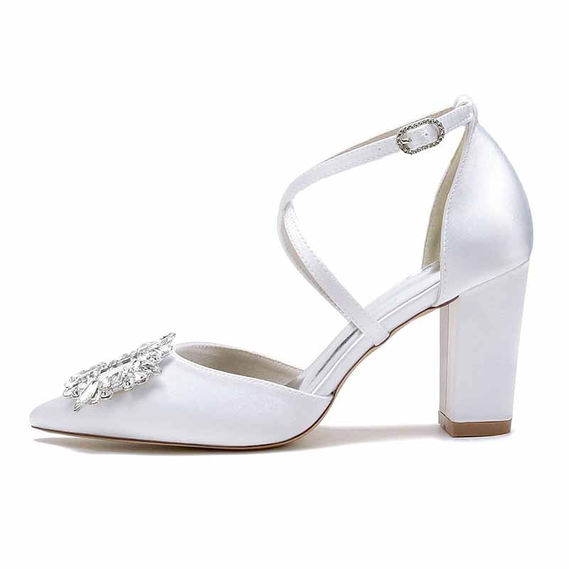 Elegant satin block heel bridal shoes with a sparkling embellishment for a chic wedding look