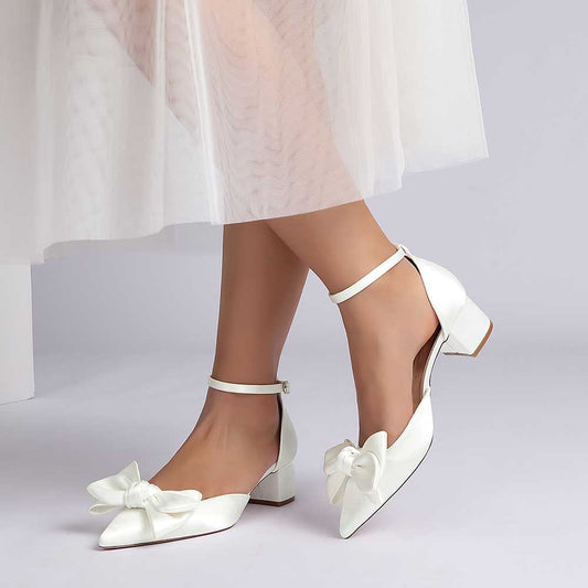 Elegant satin bow wedding shoes with ankle strap and block heel for brides on their special day