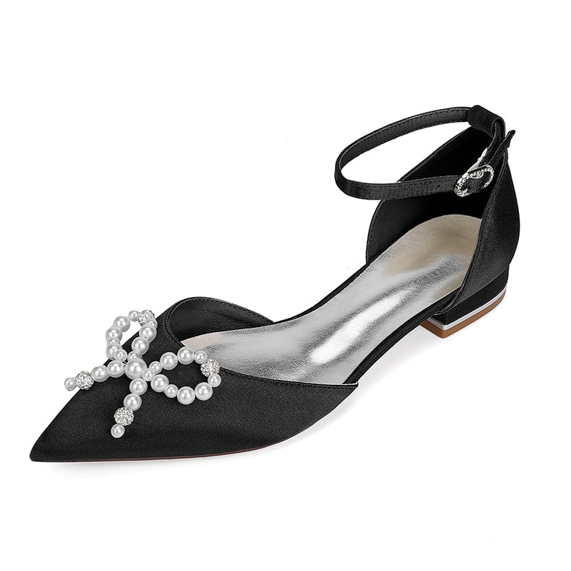 Elegant black satin bridal flats with pearl bow detail and ankle strap for weddings