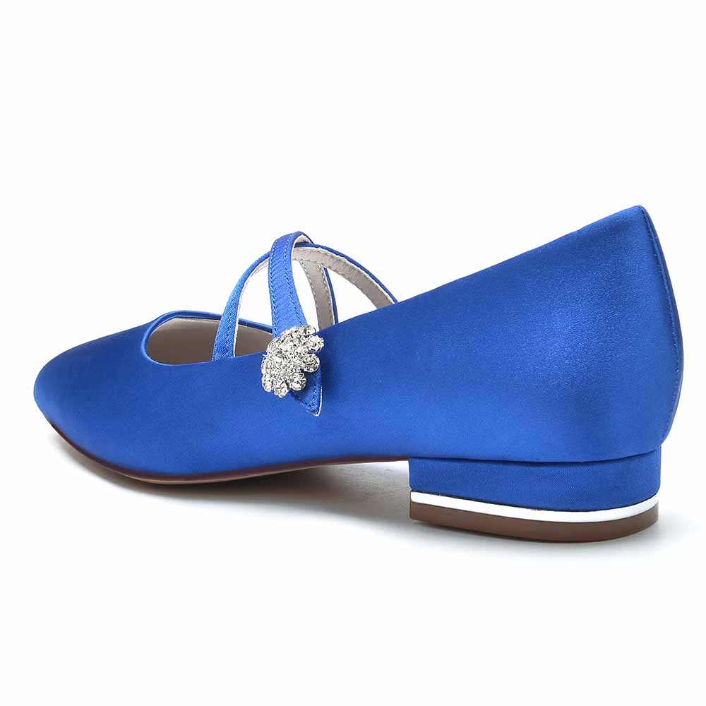 Elegant blue satin bridal flats with a decorative gem detail for stylish wedding footwear