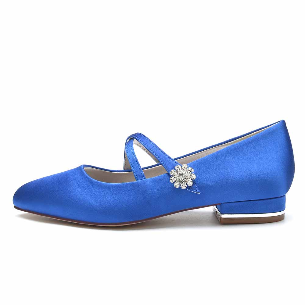 Elegant blue satin bridal flats with a stylish strap and floral embellishment for modern weddings