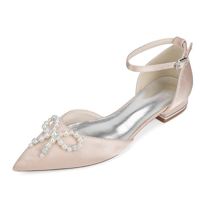 Elegant satin bridal flats with pearl embellishments and ankle strap for weddings 