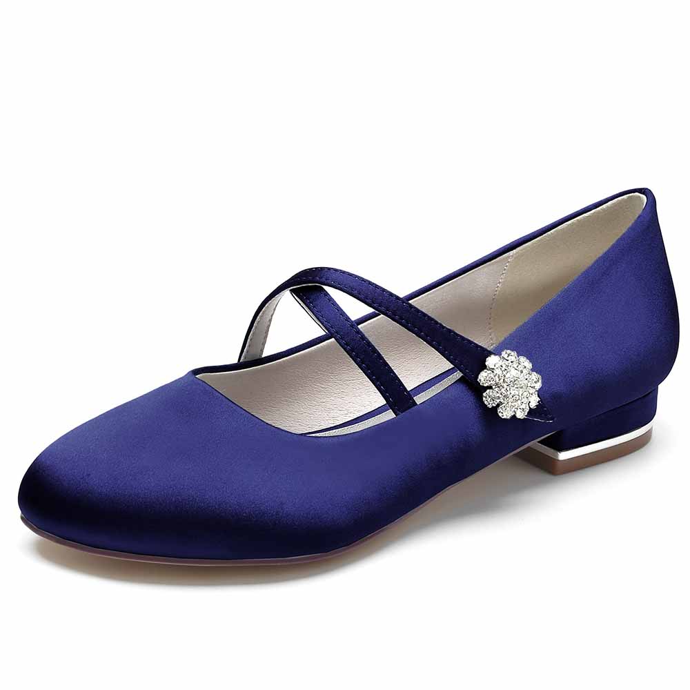 Navy satin bridal flats with cross strap design and decorative floral embellishment